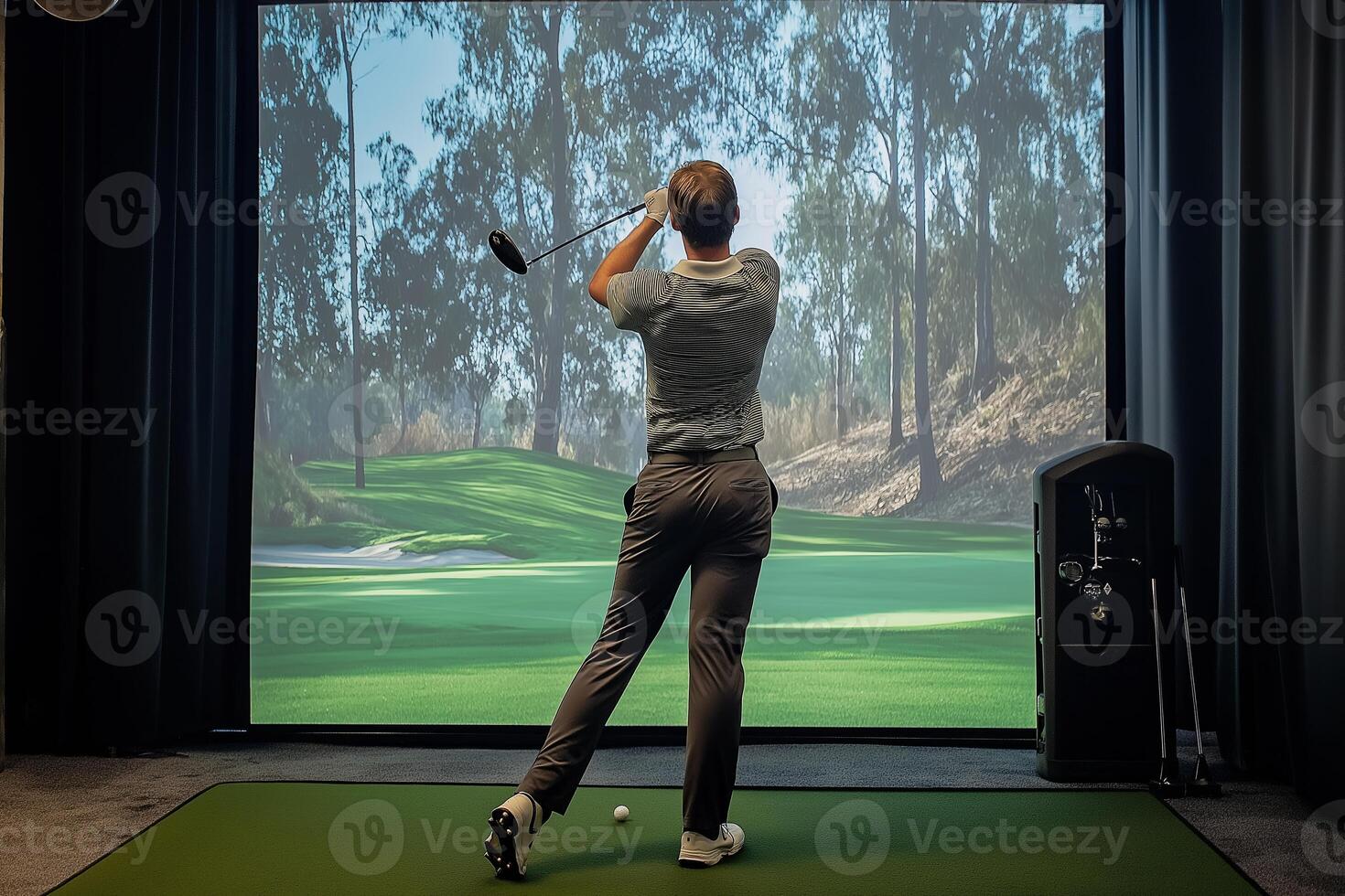 Golfer playing golf in indoor simulator Mixed media. golf simulator photo