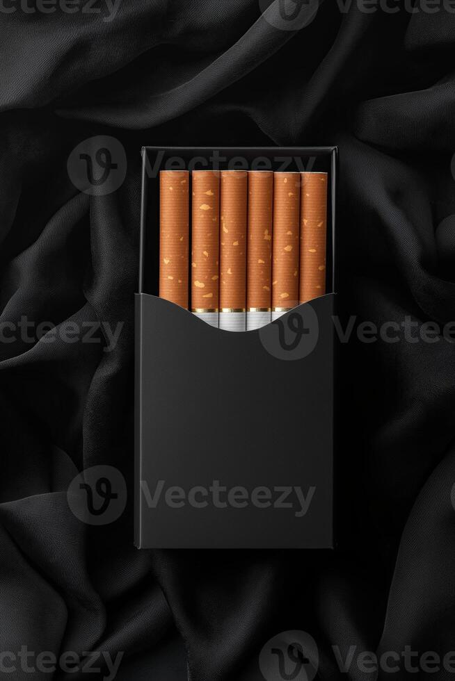 Mockup cigarettes in a black package on a black background photo