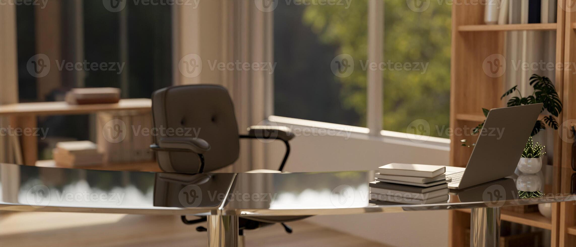A modern office desk features a laptop, books, and decor plants in a contemporary room. photo