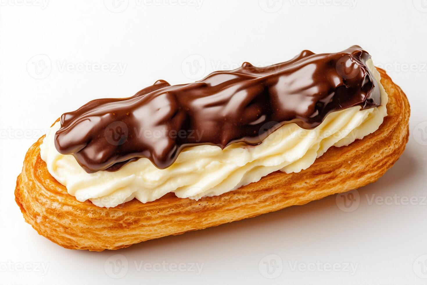 Delicious eclair topped with rich chocolate and creamy filling, perfect for desserts or sweet treats. photo