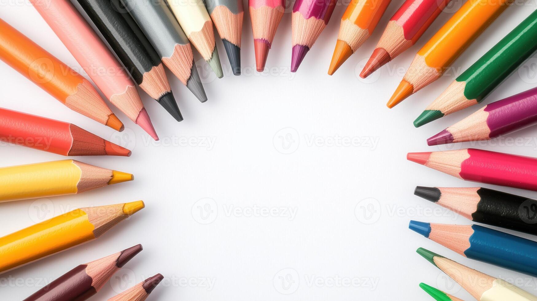 A vibrant arrangement of colorful pencils circling a blank space, perfect for creative projects and artistic expressions. photo