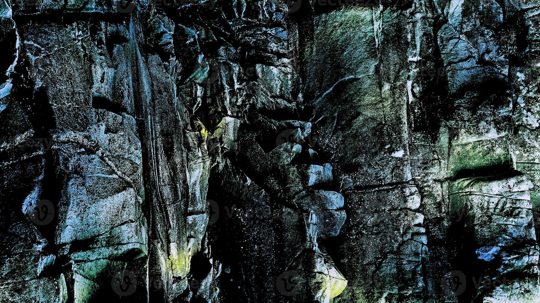Rock formation. Gray black crumbling old stones, nature background photo