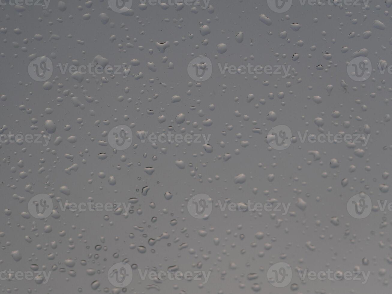 The raindrops and dust on the windshield photo
