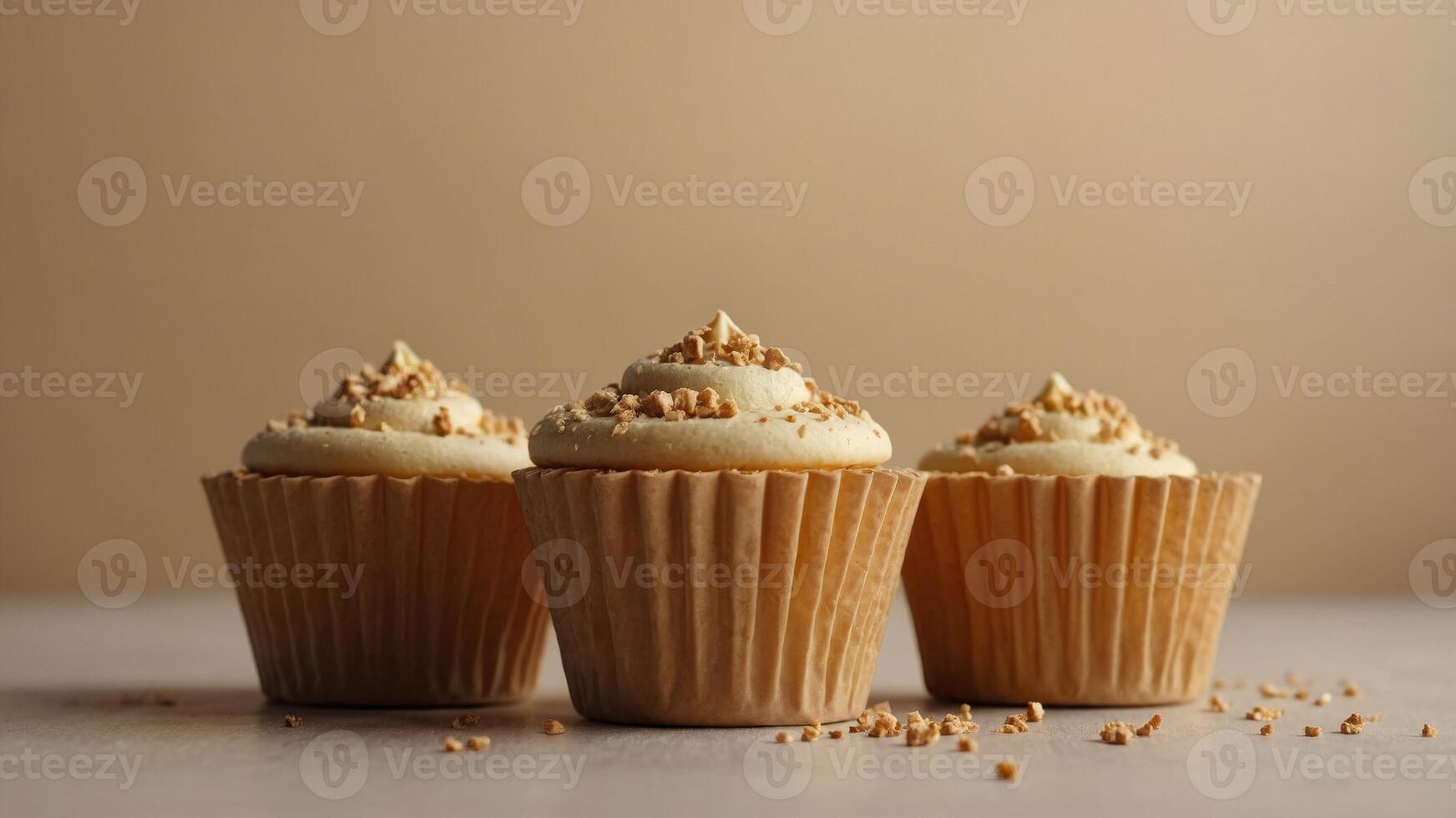 Abstract food idea of golden baking cups using cubes on pastel beige background Copy space. photo