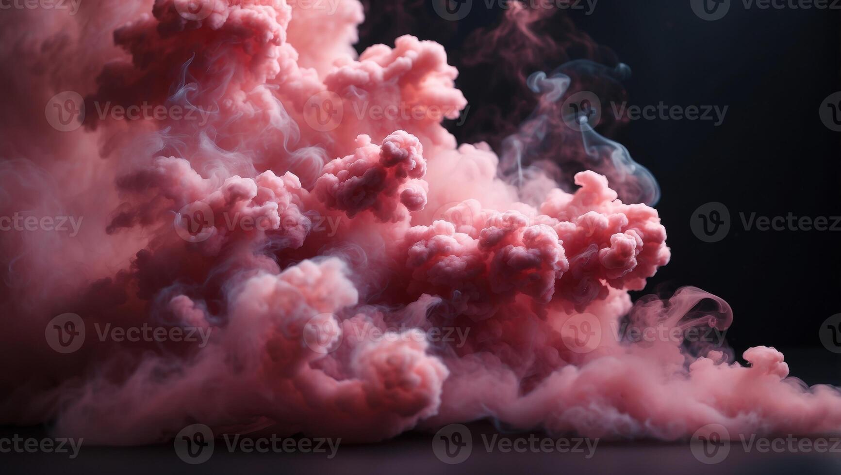 Abstract cloud of pink smoke on a dark background. photo