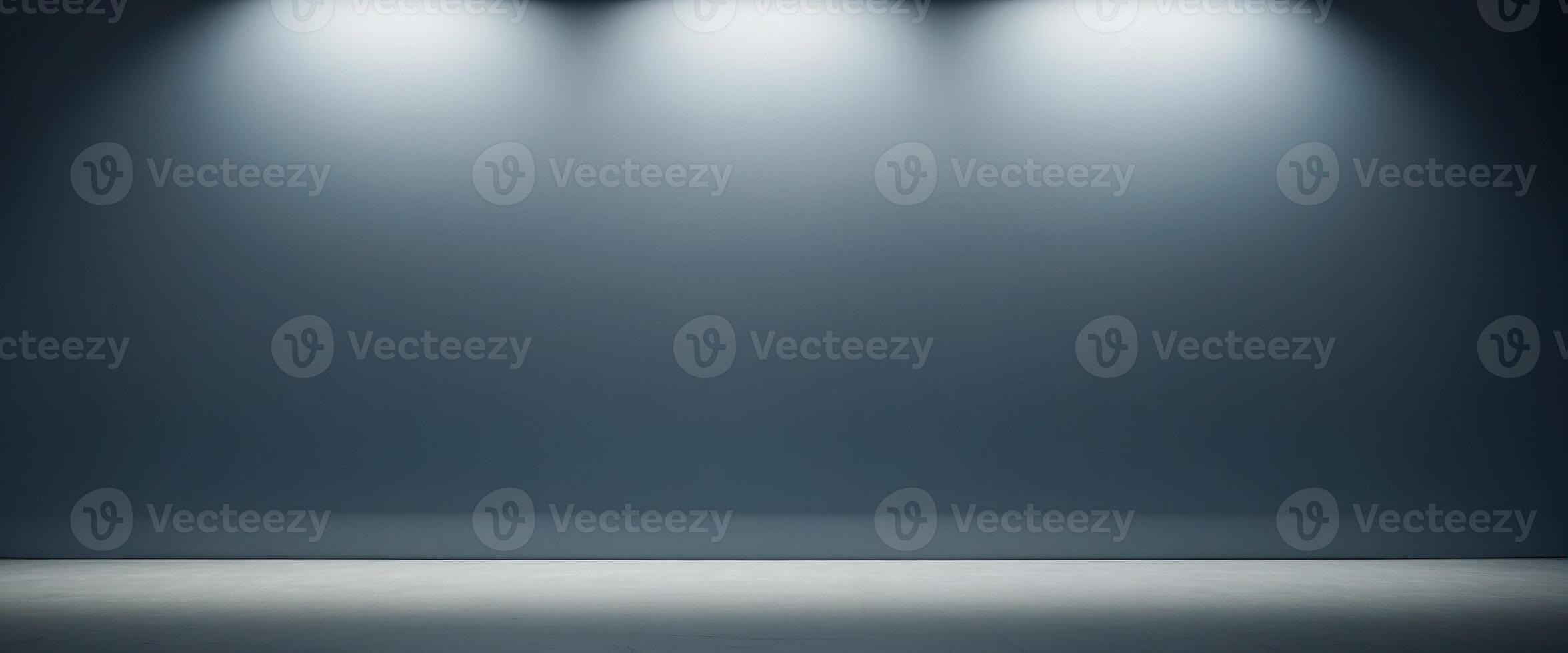 Beautiful gray-blue empty wall with lateral lighting and interesting chiaroscuro Minimalistic background for product presentation. photo