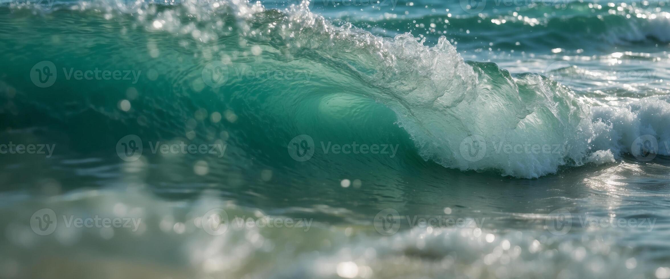 Beautiful natural texture of sea surf with white foam and clear water with turquoise and green hues. photo