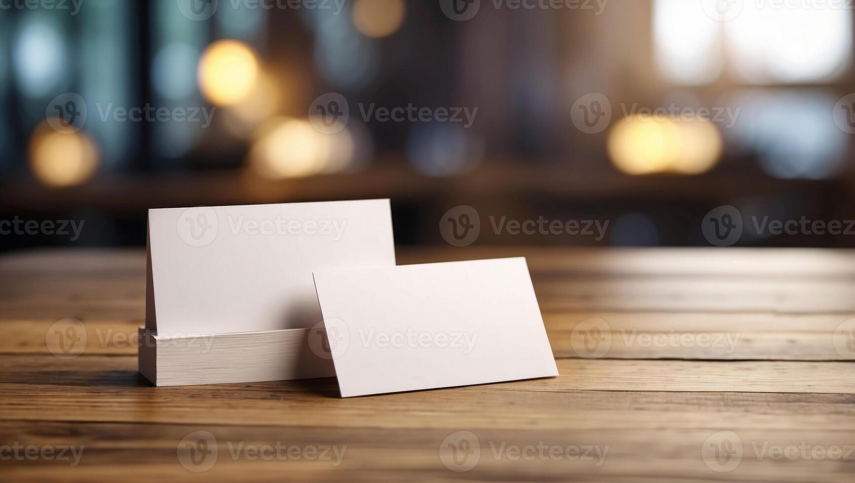 Blank business cards on wooden table Mockup for branding identity. photo