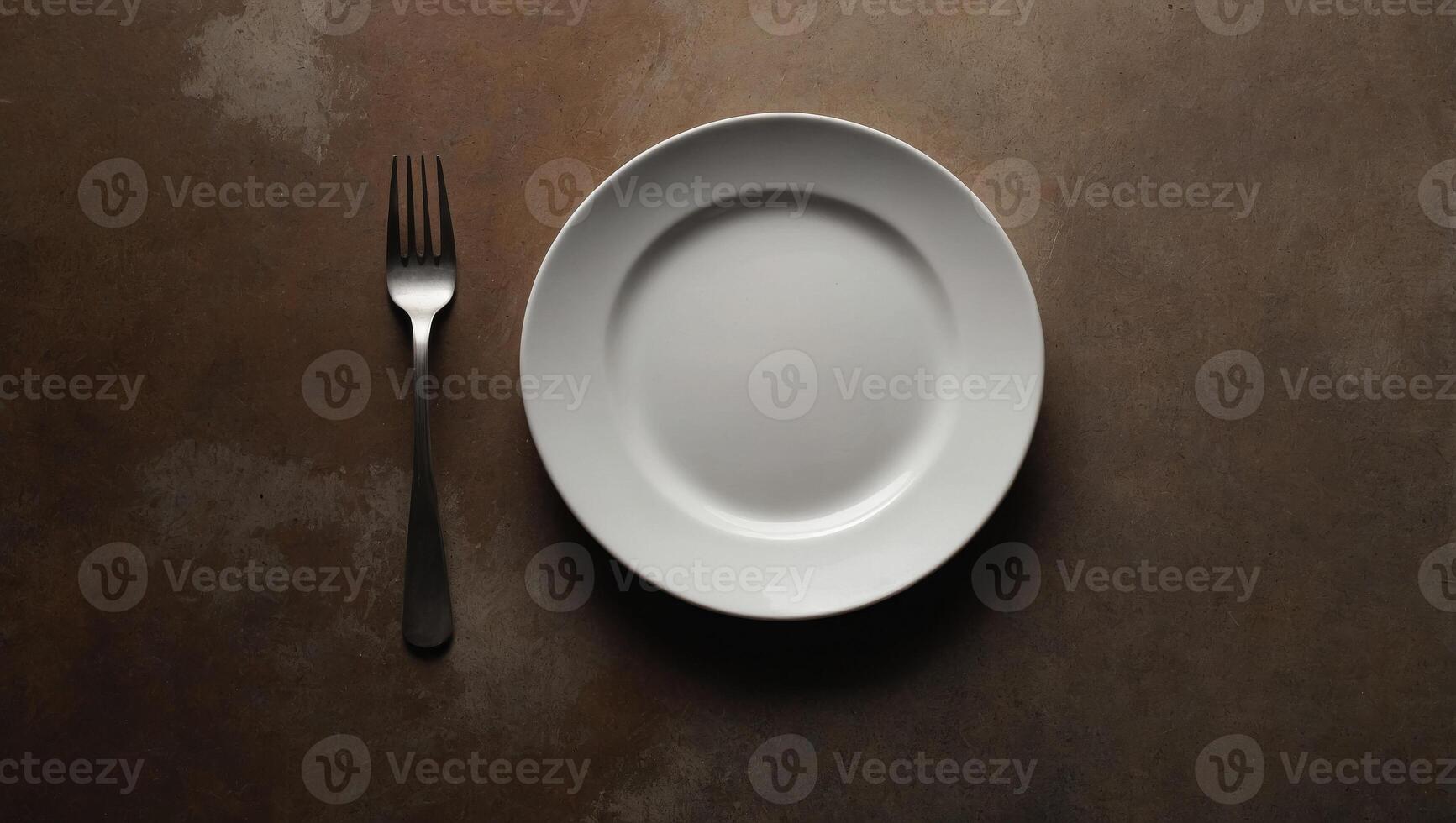 Empty white ceramic plate on brown concrete background Top view, copy space for food or other objects. photo