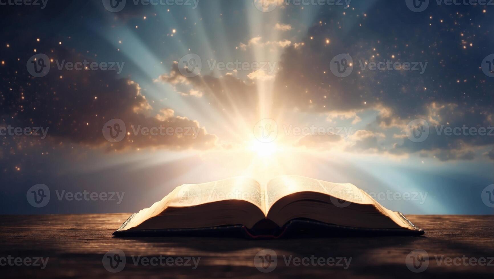 Opened bible in the sky with rays of light coming from above. photo