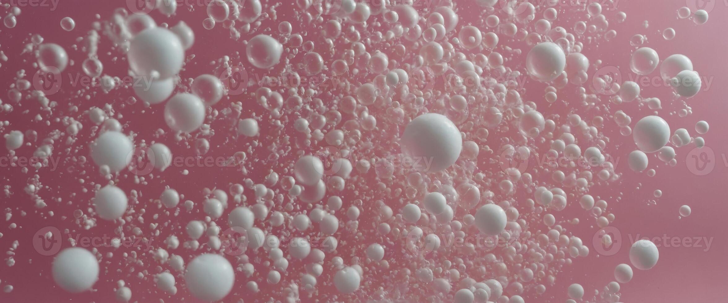 Pink pastel background with white foam bubbles perfect for laundry and cleaning services. photo
