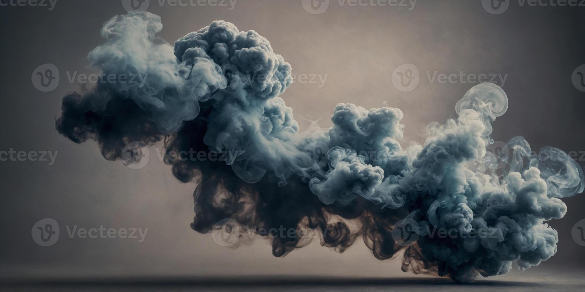 The smoke seems to come alive morphing into different shapes and colors with each passing second. photo