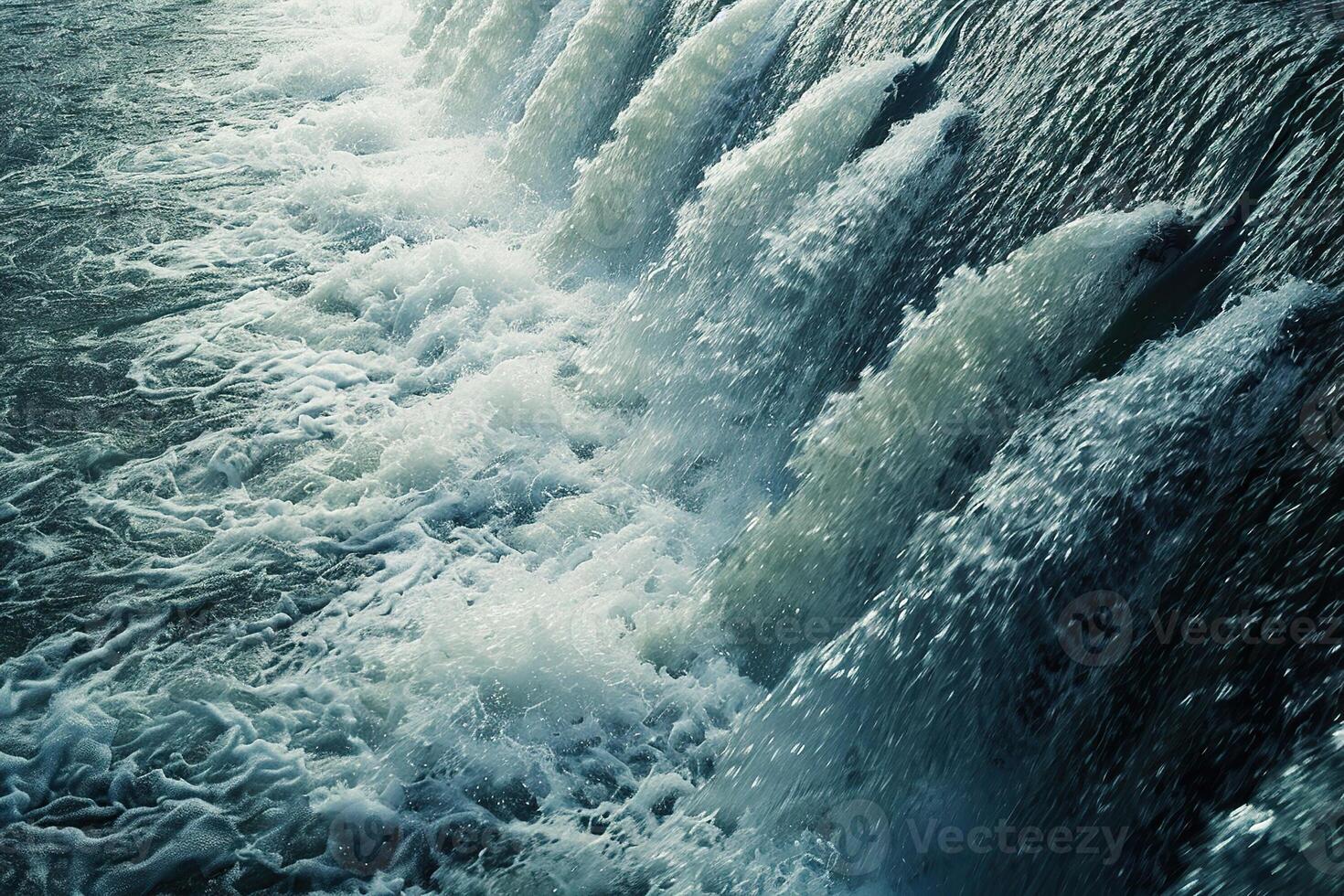 Hydroelectric power energy plant with large turbines and water spills photo