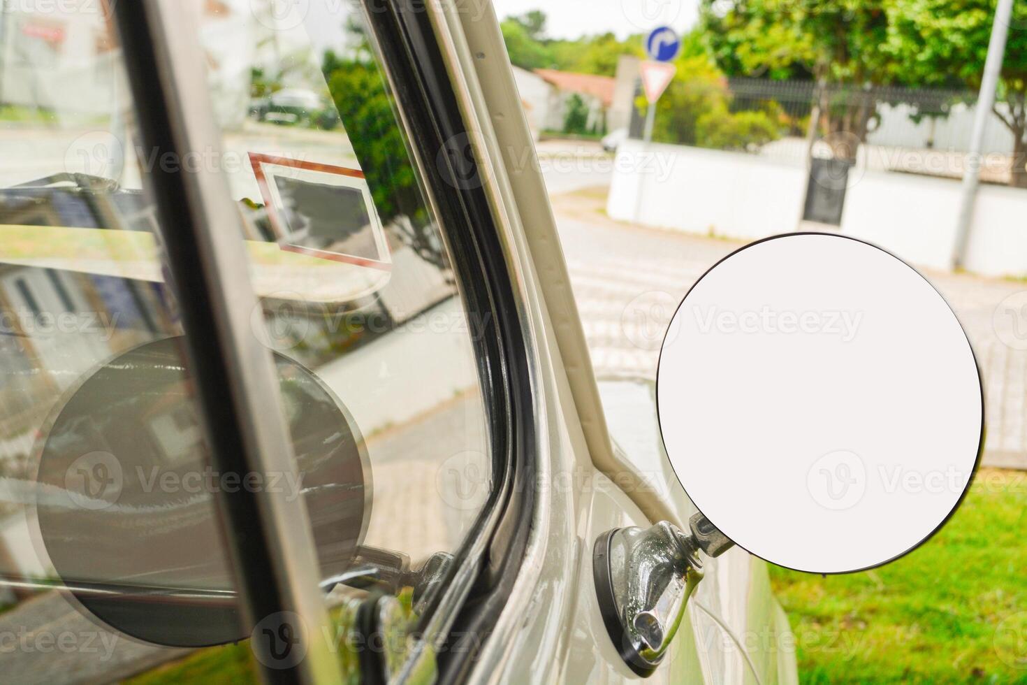 Close-up of a round mirror in a silver retro car with a place for a signature on the mirror. Concept of love for luxury, old money style with a mockup. photo