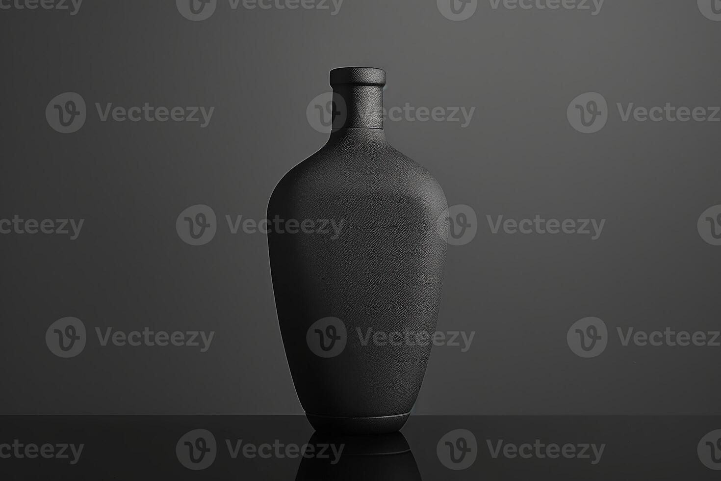 A solitary black shampoo bottle stands elegantly against a shadowy background, showcasing its modern design and sophisticated texture. photo