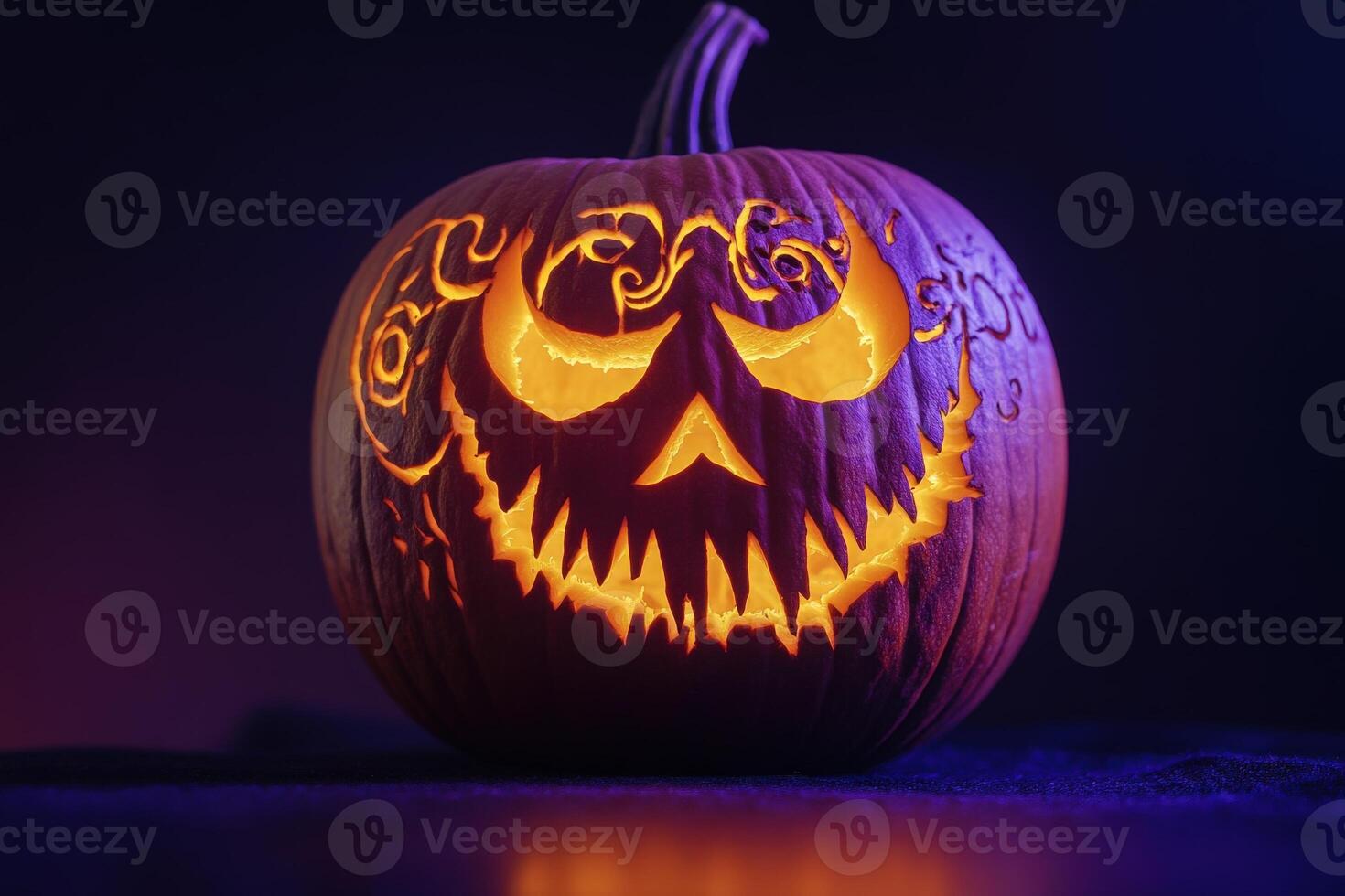 A beautifully carved pumpkin radiates a warm glow, showcasing intricate designs perfect for autumn celebrations. photo