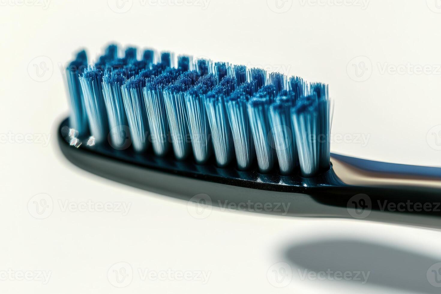 An elegant electric toothbrush rests against a soft background, highlighting its stylish design and innovative bristles, perfect for contemporary dental hygiene. photo