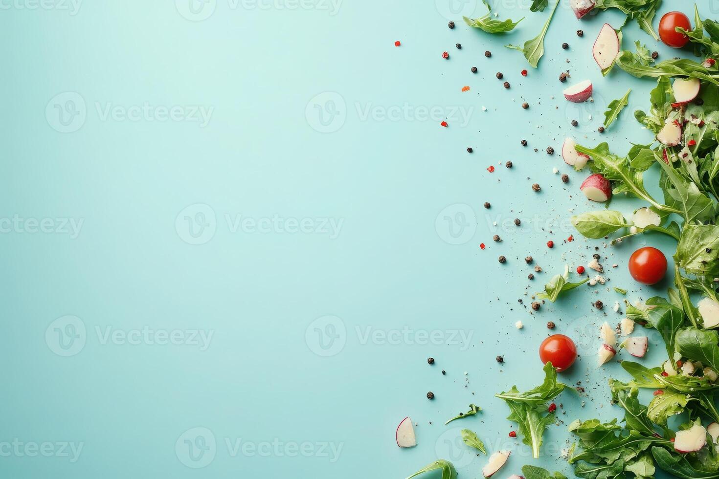 A vibrant mix of tomatoes, radishes, and greens creates a delightful composition on a serene backdrop. photo