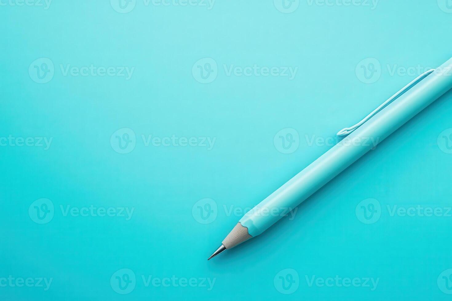 A bright turquoise surface hosts an array of stationery, inspiring creativity during an engaging brainstorming session. photo