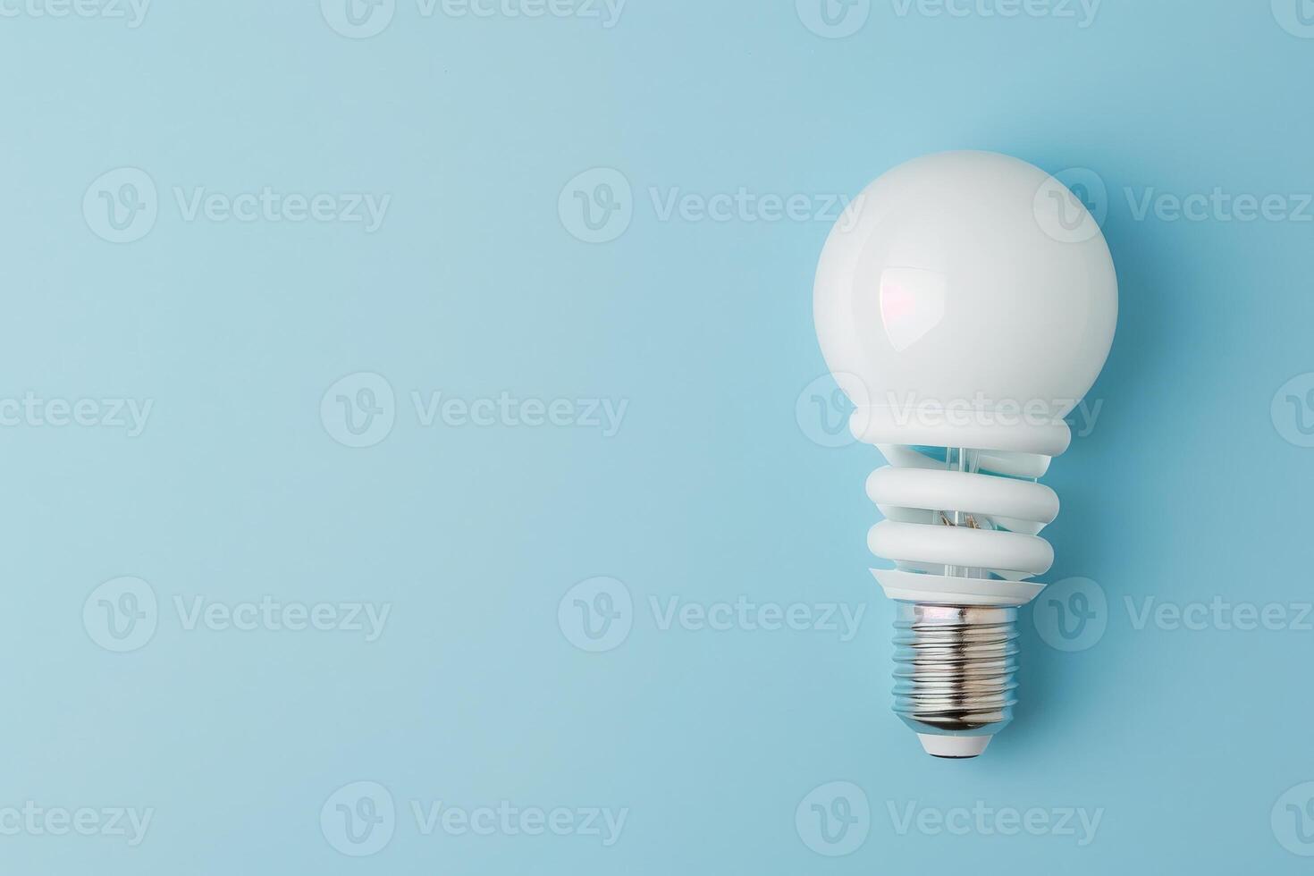 A modern energy-efficient light bulb rests on a soothing pastel surface, showcasing its sleek design and eco-friendly features. photo