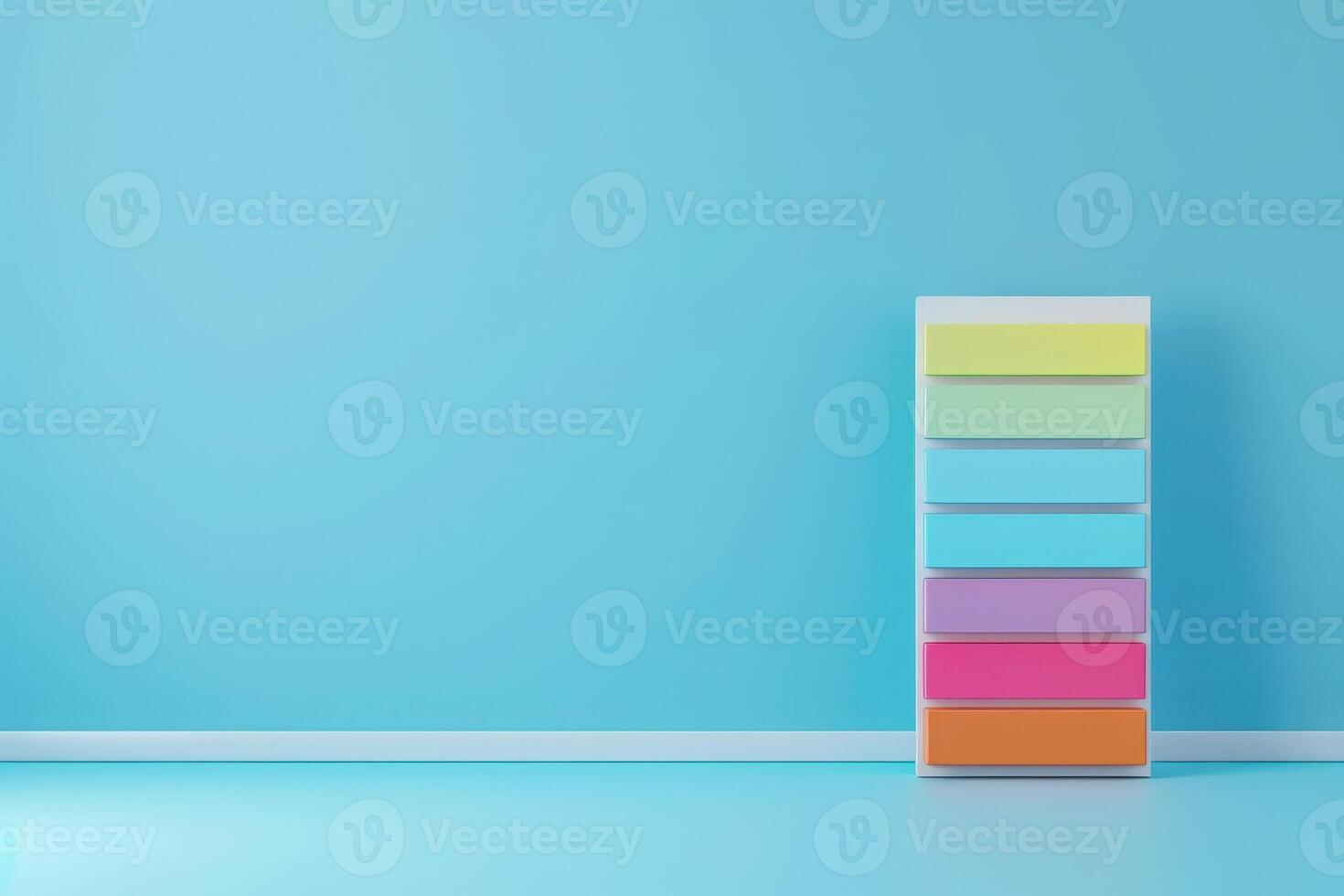 A vibrant set of storage drawers stands against a soothing blue wall, creating an inviting and organized atmosphere. photo