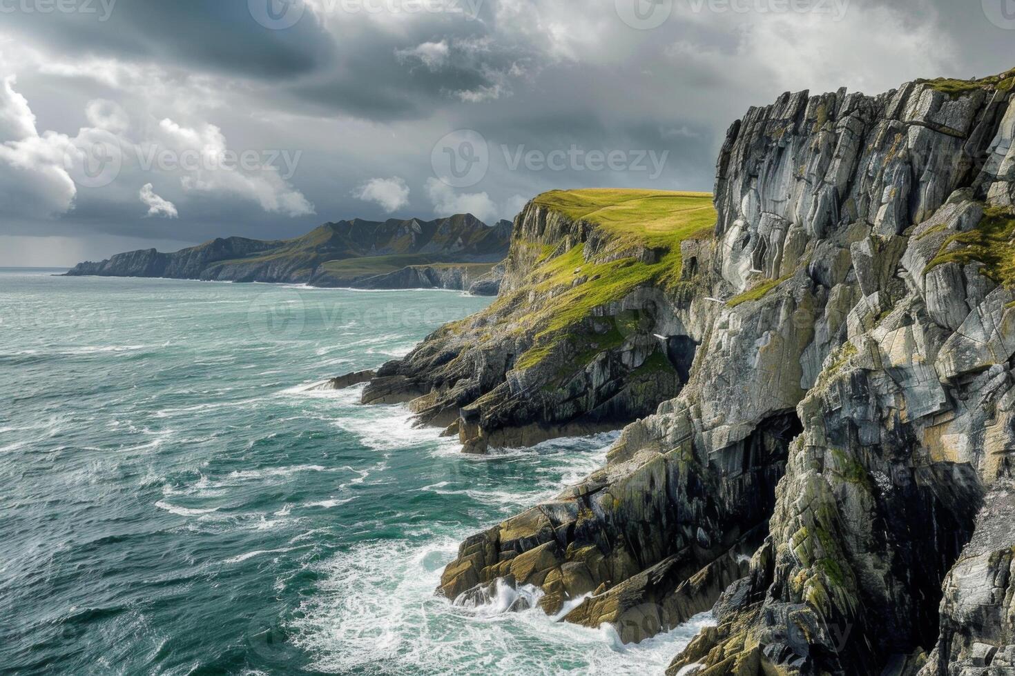 Dramatic Coastal Cliffs with Rough Seas photo