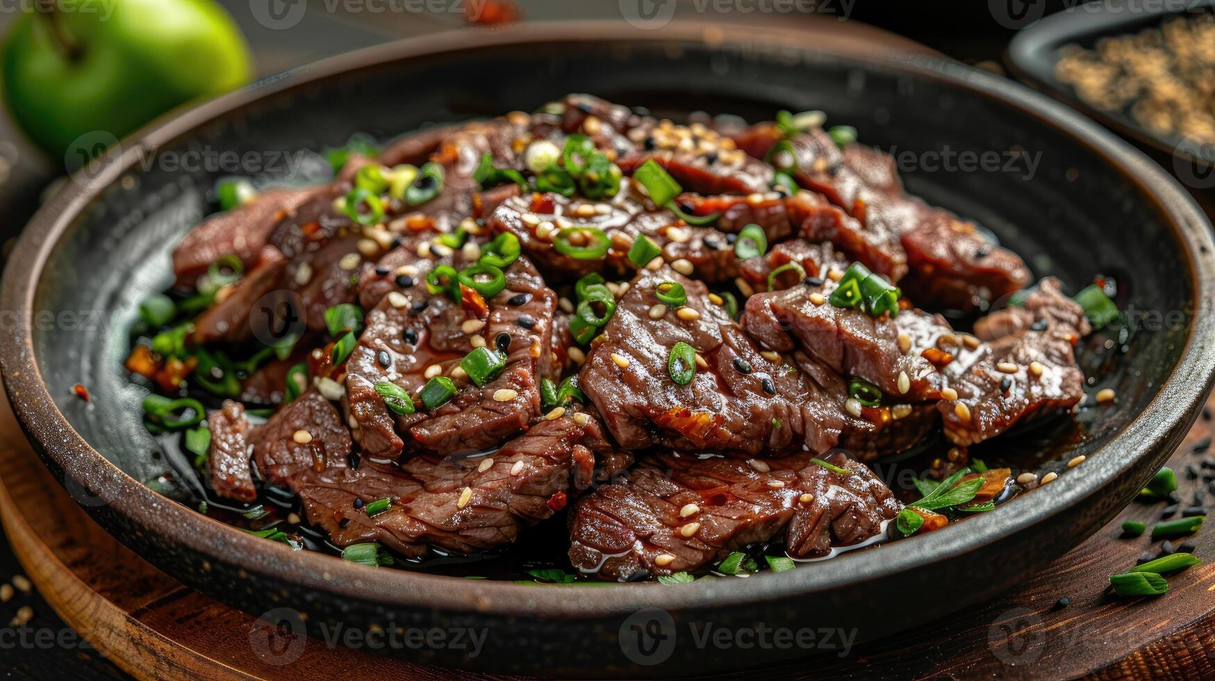 Seared Beef with Sesame Seeds and Green Onions in a Bowl photo