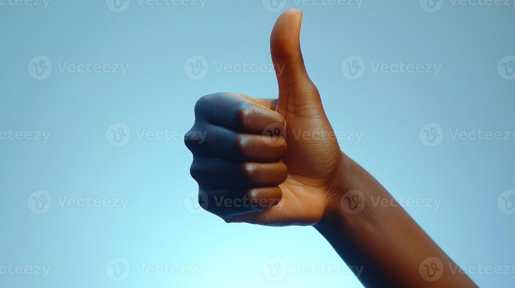 A Hand Giving a Thumbs Up Gesture photo