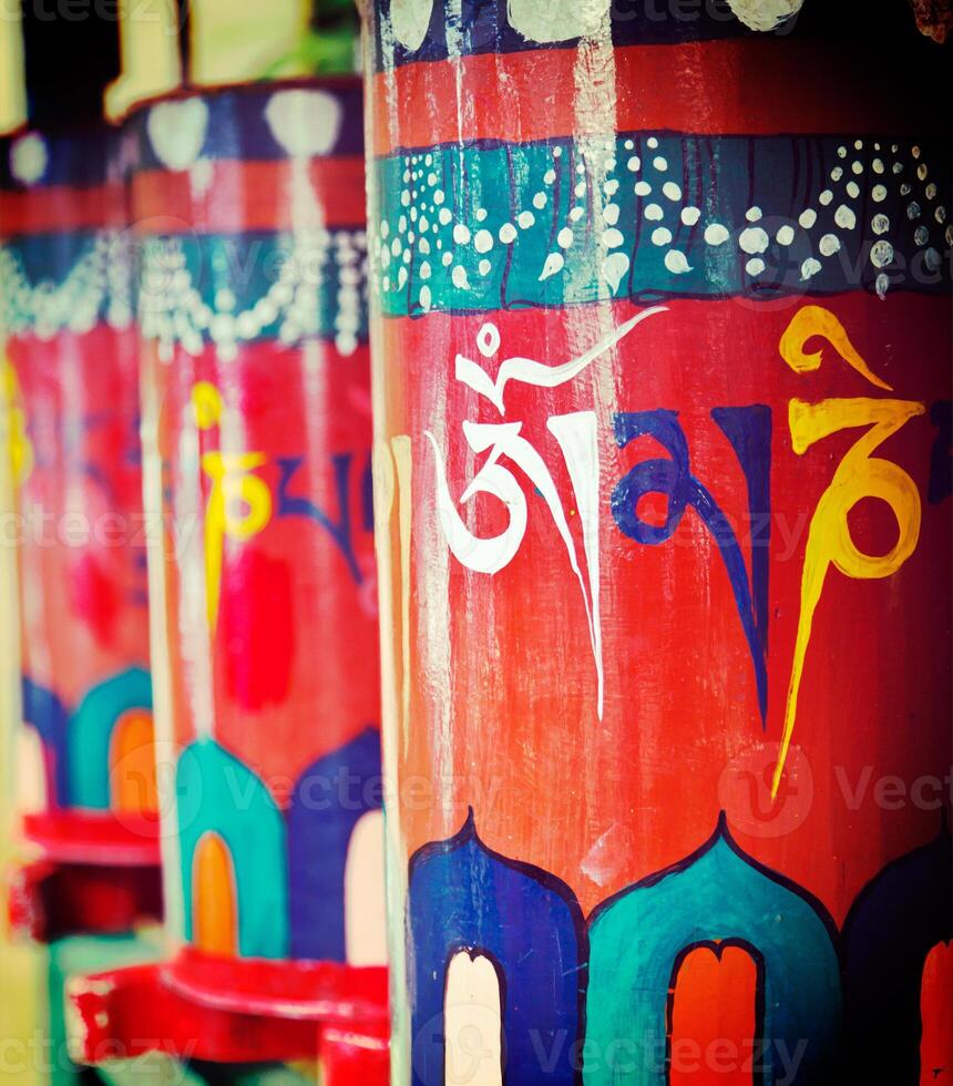 Buddhist prayer wheels photo