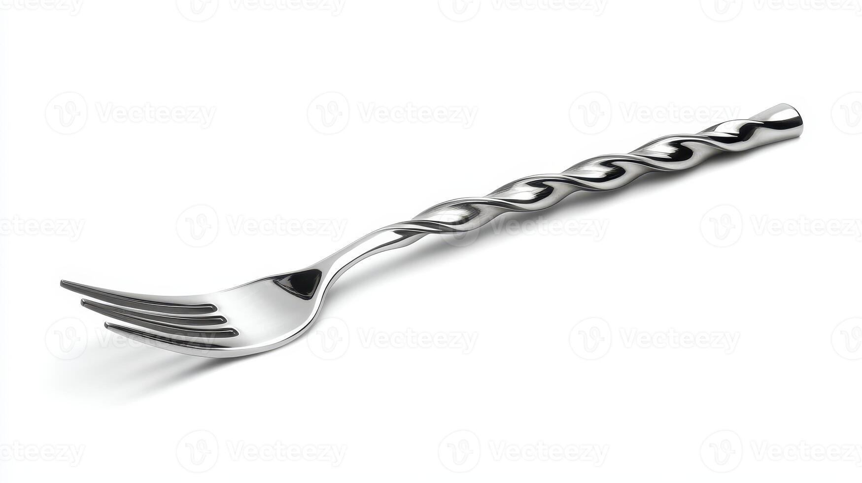 A twisted metal fork resting on a plain surface, showcasing its unique design and reflective finish photo