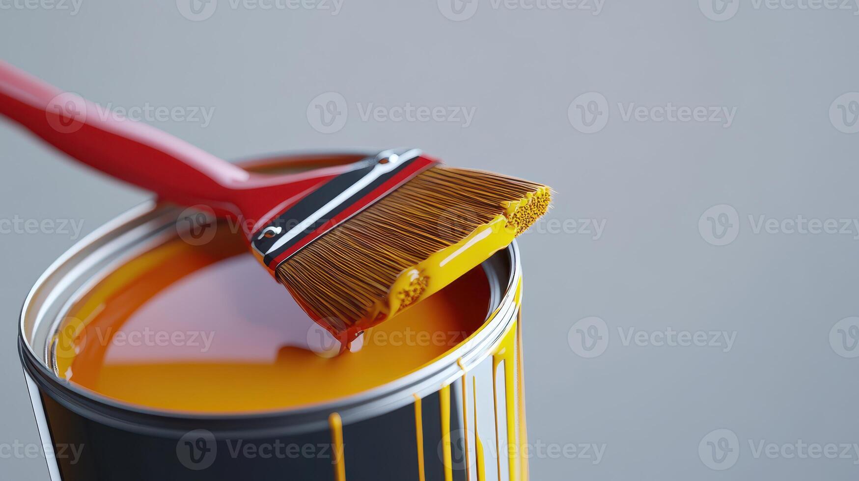 Bright yellow paint with a brush resting on the can, showcasing a cheerful home improvement project in progress photo