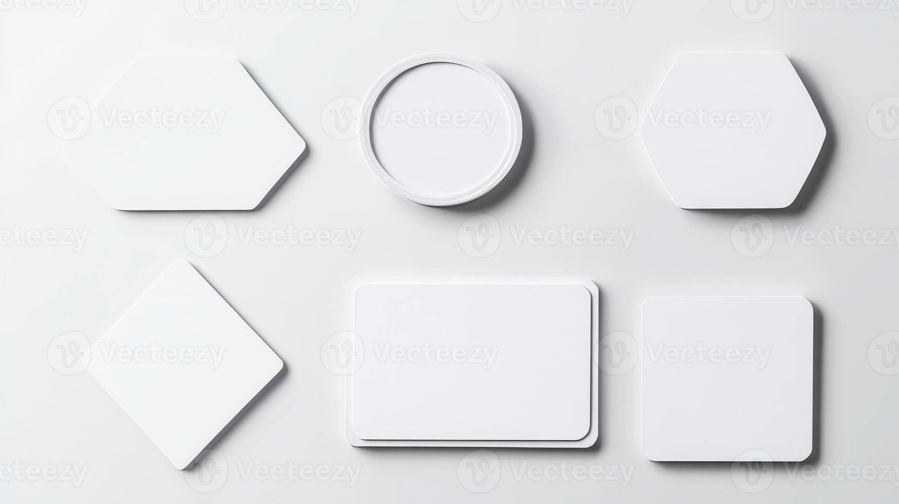 Collection of various blank shapes on a light surface showcasing design elements for creative projects photo