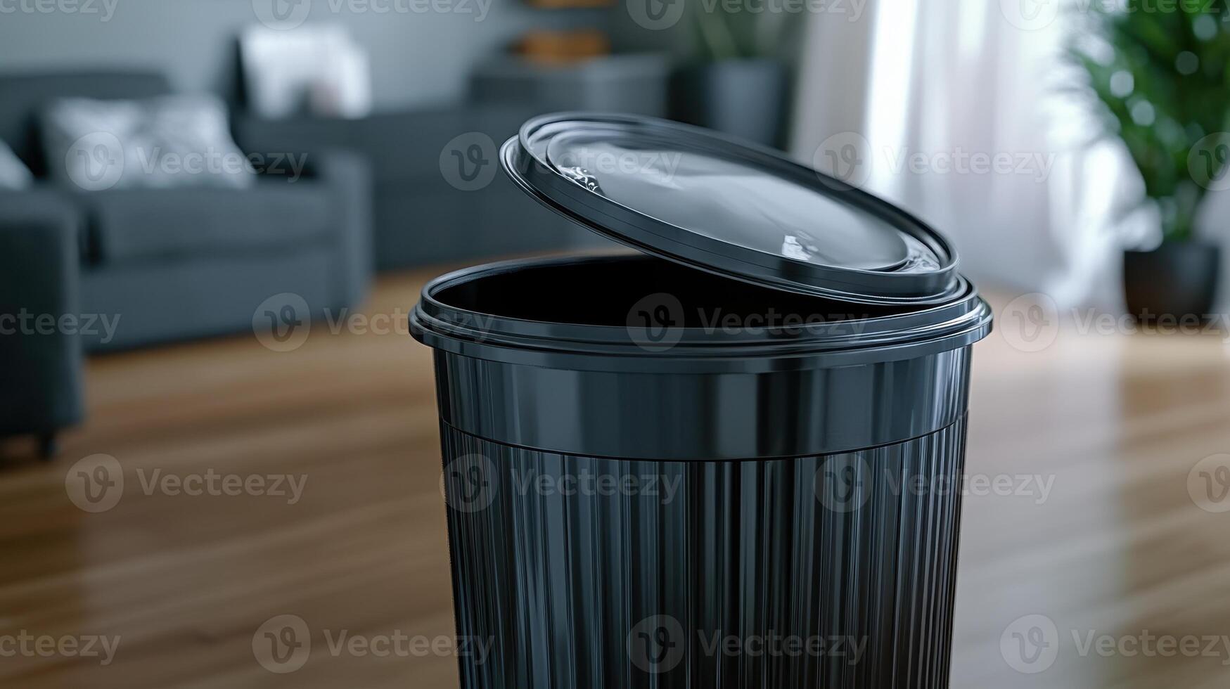 Black trash can with lid open in a modern living room during daylight photo
