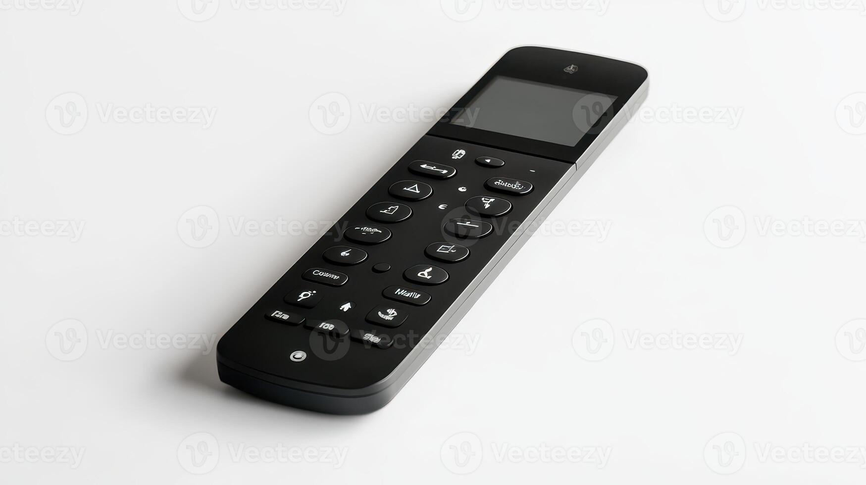 Black remote control with buttons placed on a white background photo