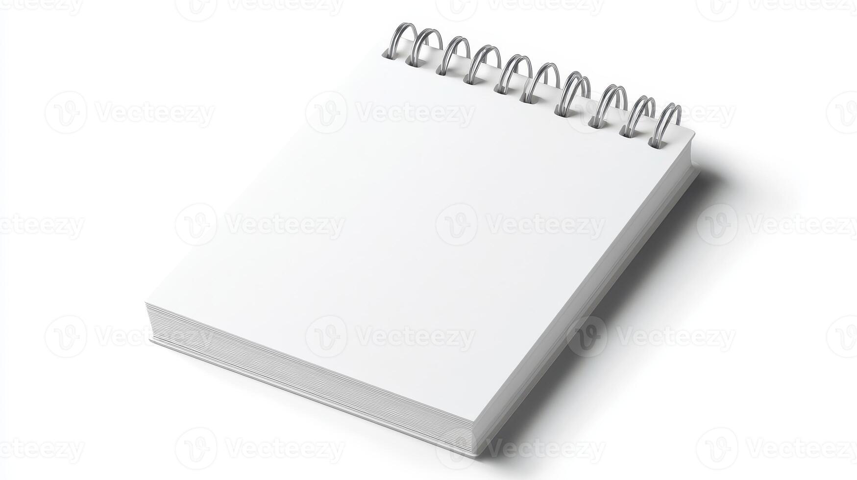 Blank spiral notebook placed on a clean surface, ready for notes or sketches during early morning hours photo
