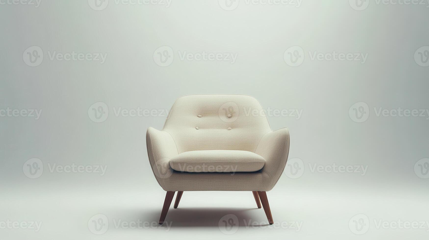 Modern light-colored armchair positioned against a minimalist gray backdrop in a contemporary living space photo