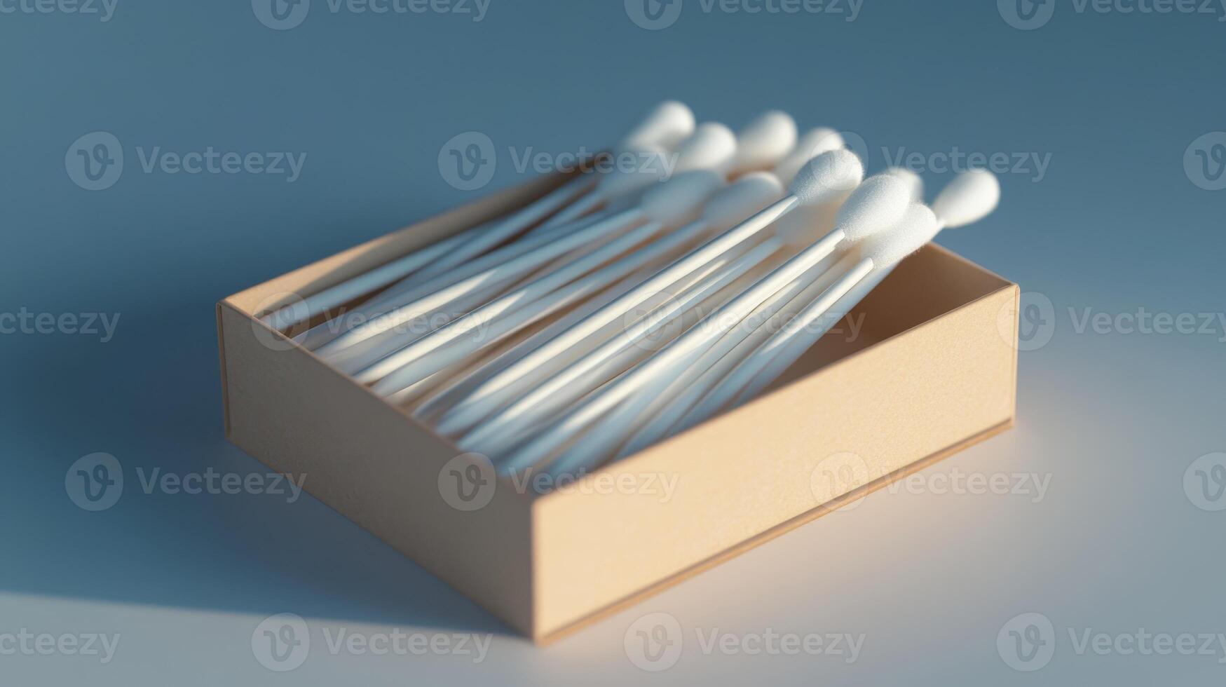 Box of cotton swabs neatly arranged on a flat surface in soft lighting photo