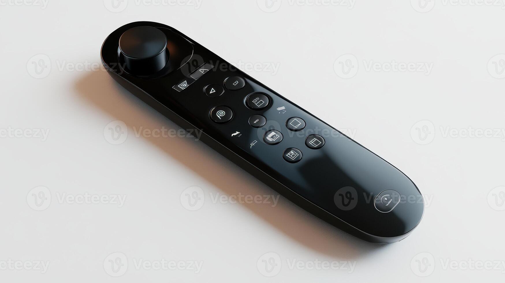 A sleek black remote control with buttons and a navigation wheel on a light surface photo