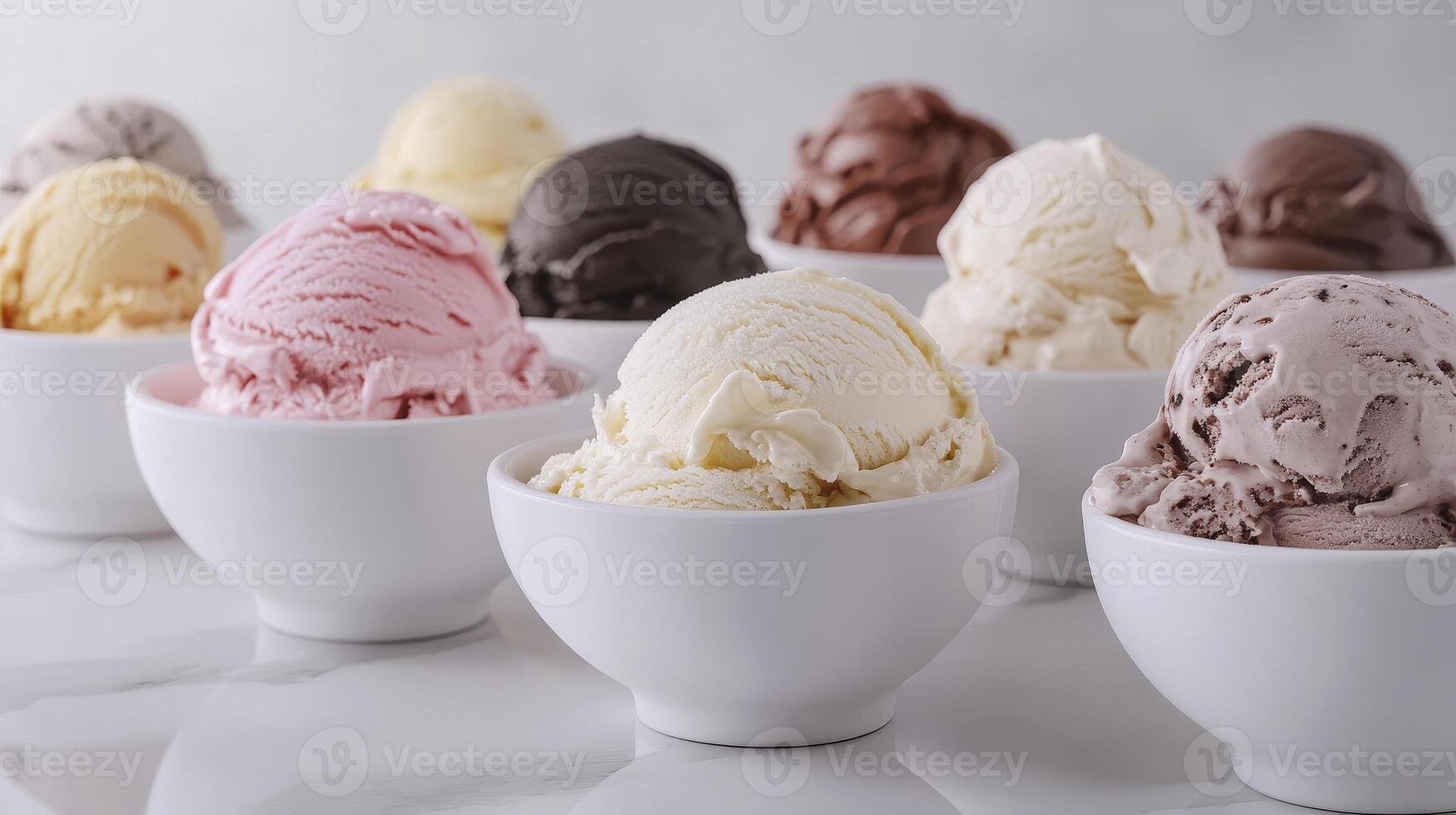 Assorted Ice Cream Scoops Displayed in White Bowls on a Marble Surface photo