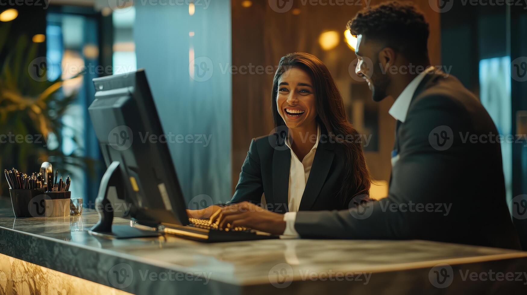 Professional Hosts Engaging With Guests at a Modern Reception Desk in a Hotel Lobby During Daylight Hours photo
