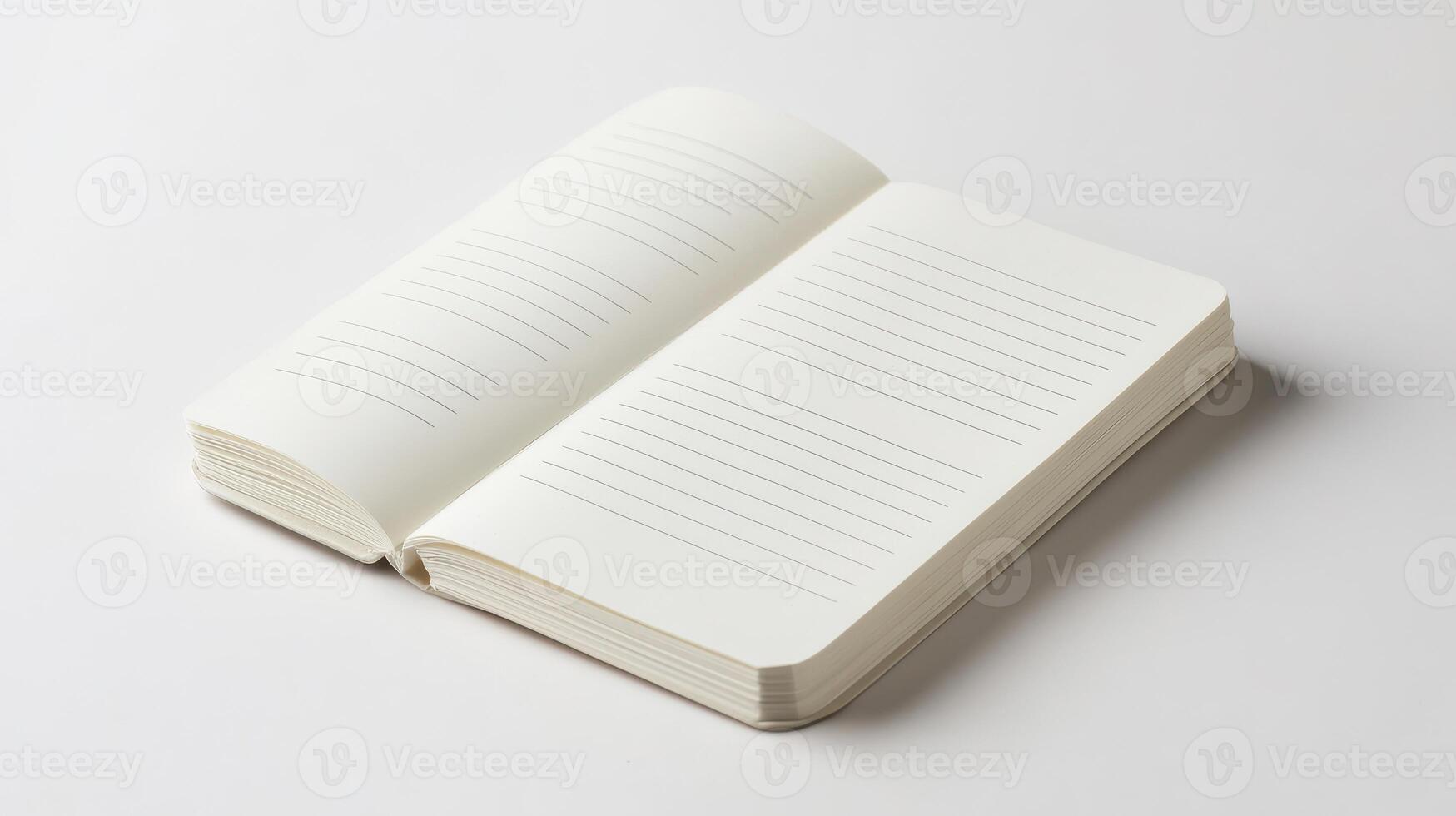 Open blank notebook on a clean surface ready for writing or sketching in a minimalist setting photo