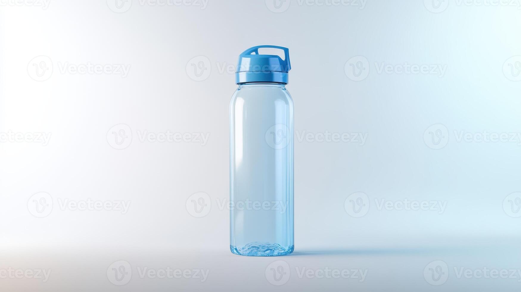 Transparent water bottle with blue lid on light background photo