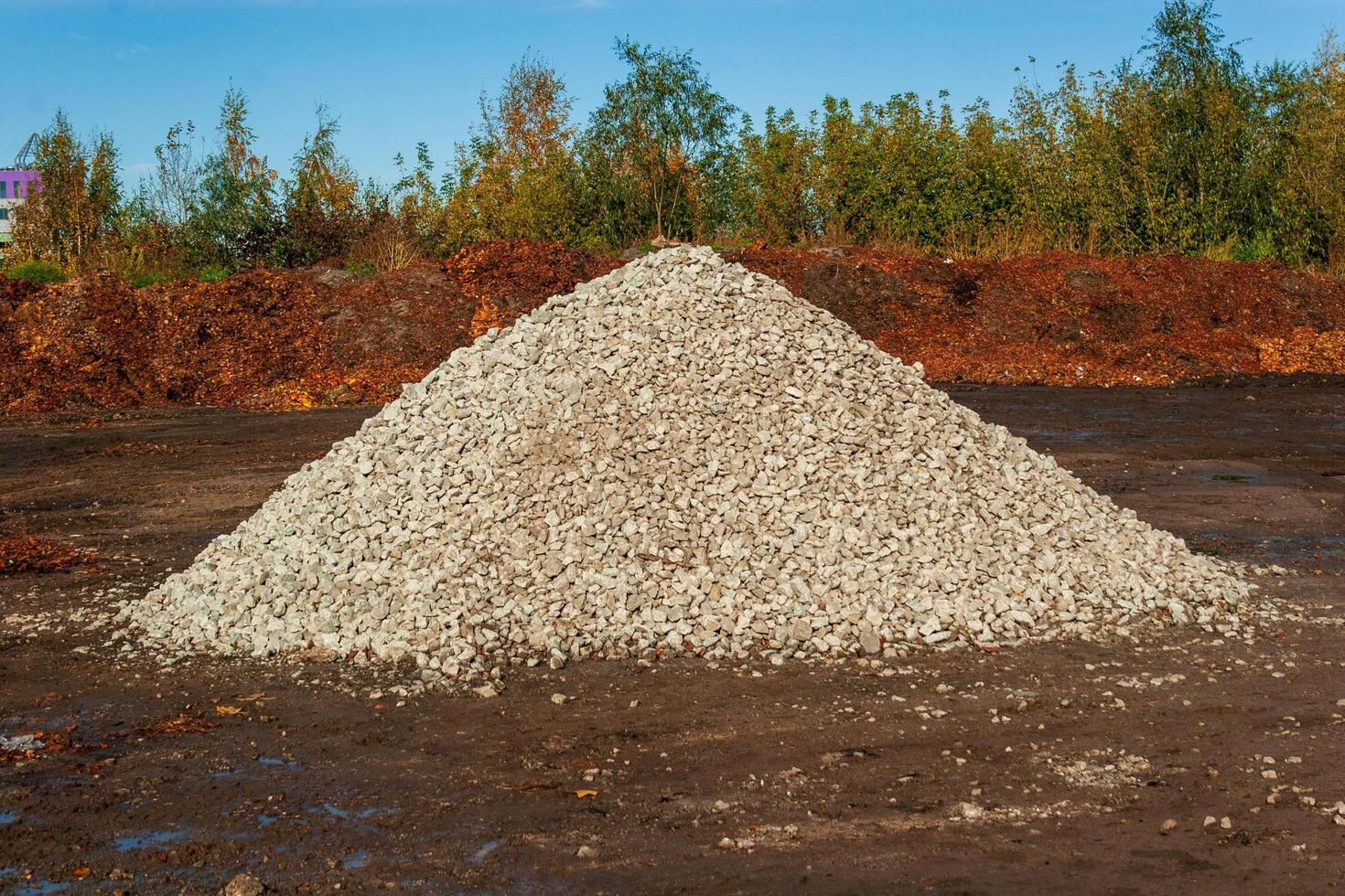 large pile of white gravel in the construction site photo