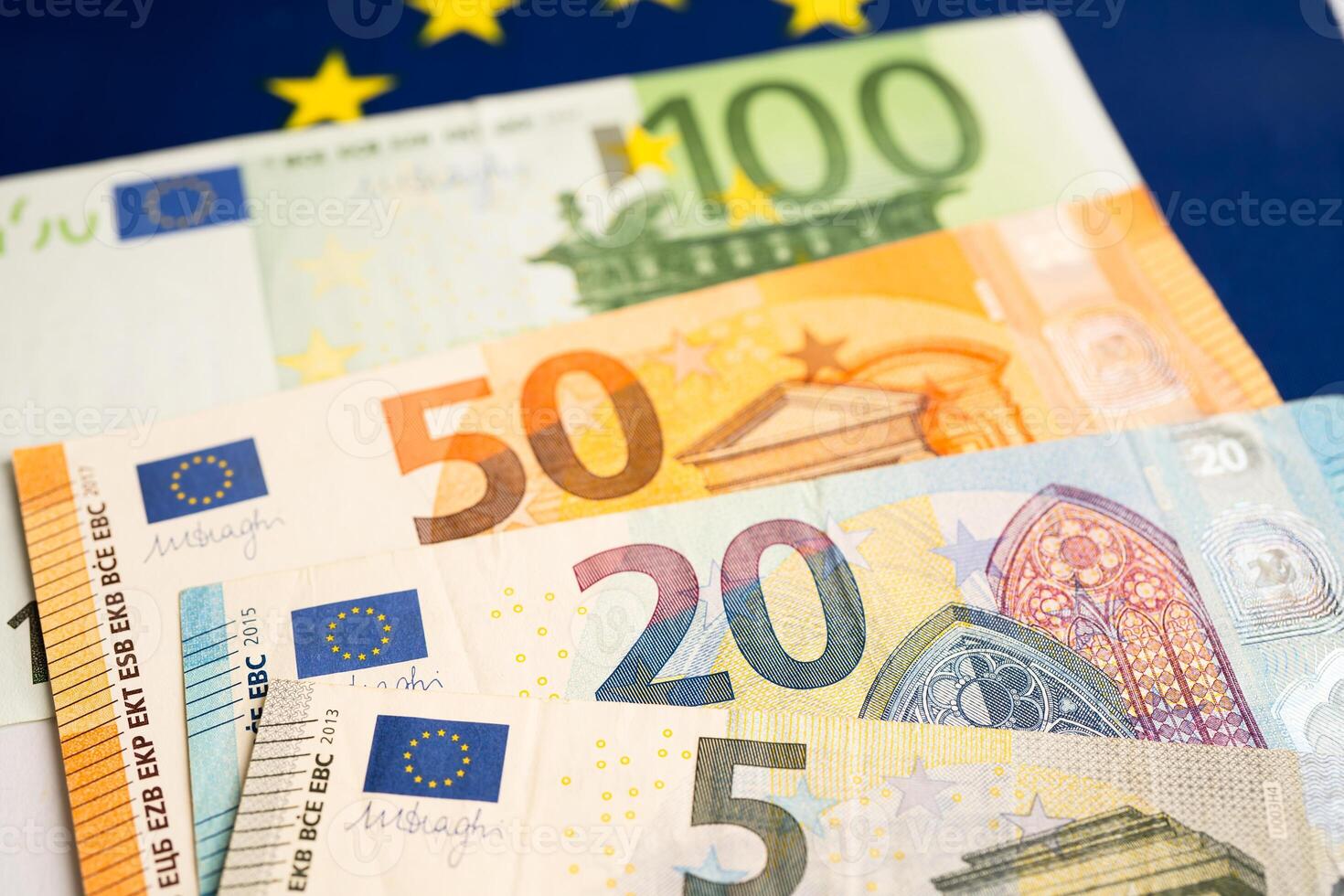 Euro banknotes on flag, Business and finance concept. photo