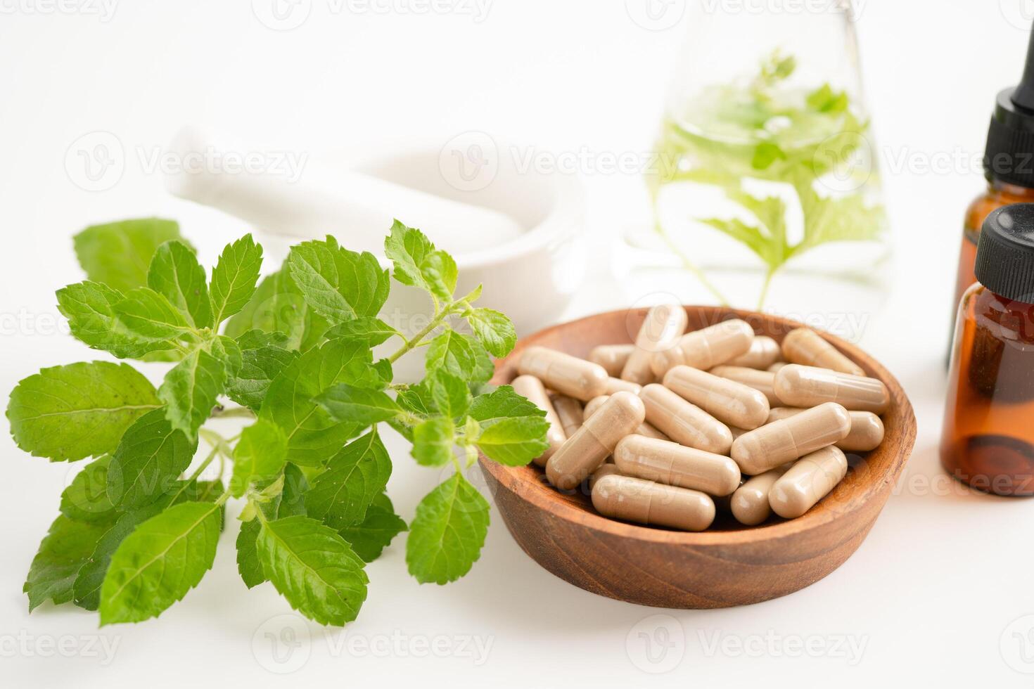 Alternative medicine herbal organic capsule with vitamin E omega 3 fish oil, mineral, drug with herbs leaf natural supplements for healthy good life. photo