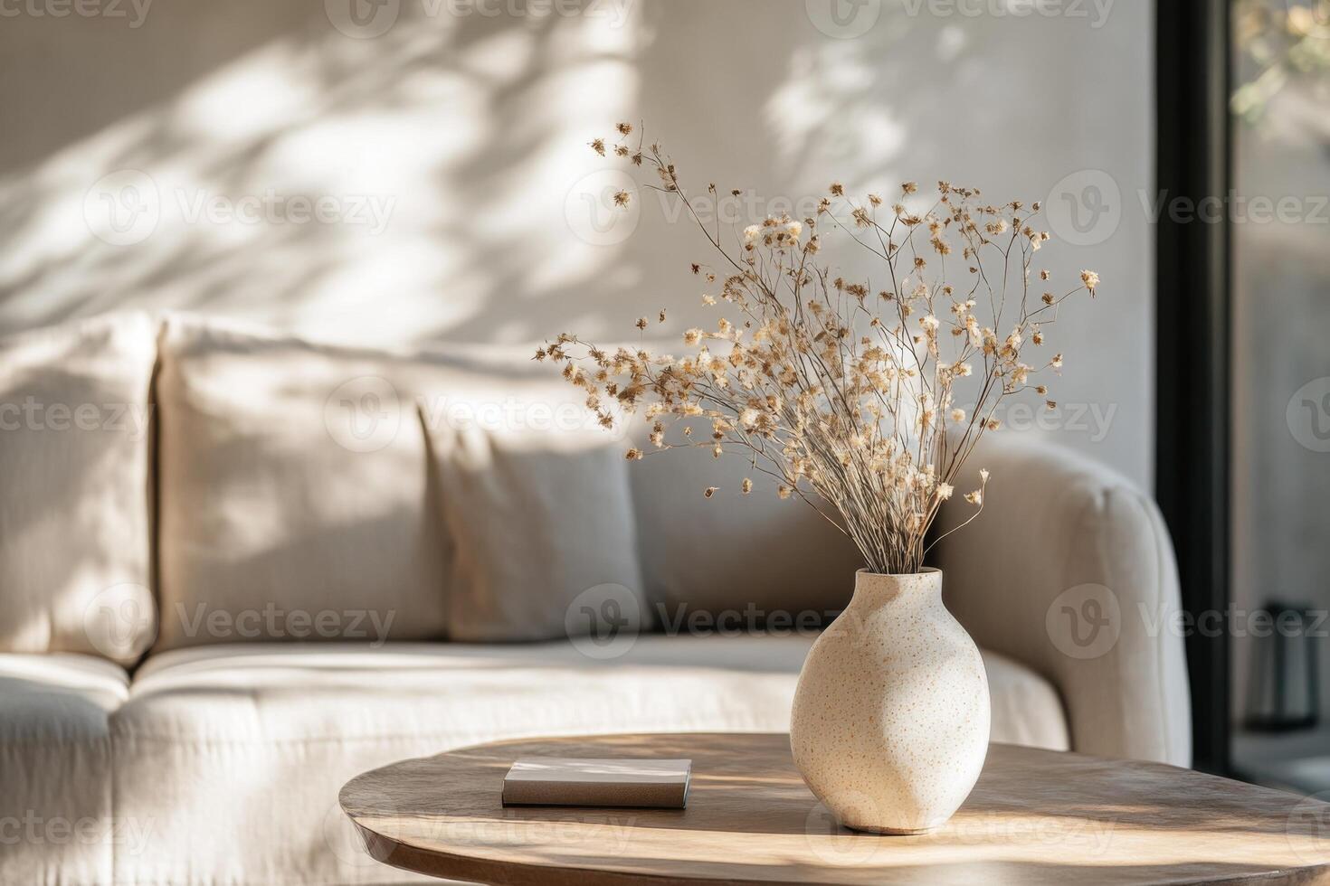 Ceramic vase with dried flowers indoors photo