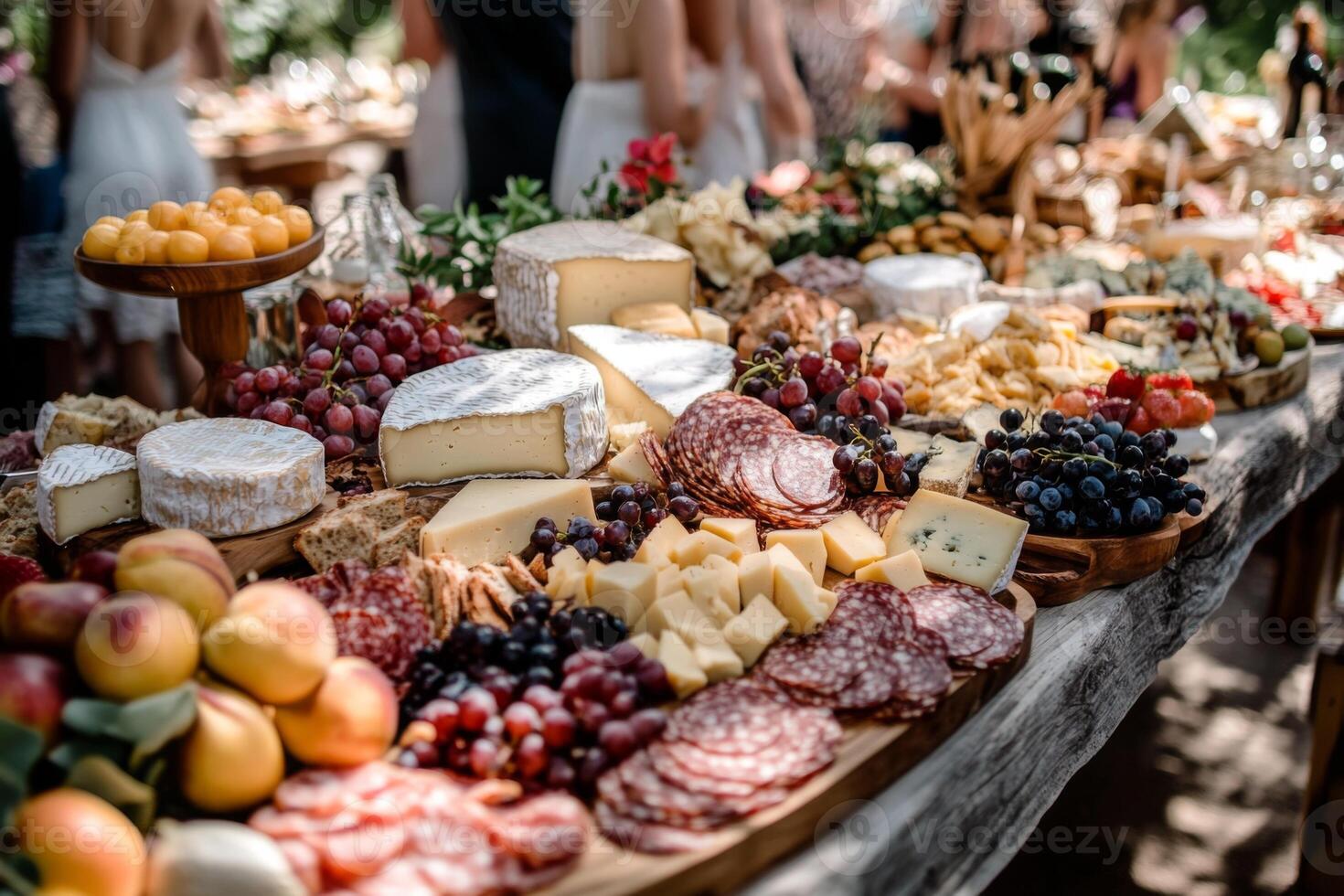 Elegant outdoor wedding feast with a giant table photo