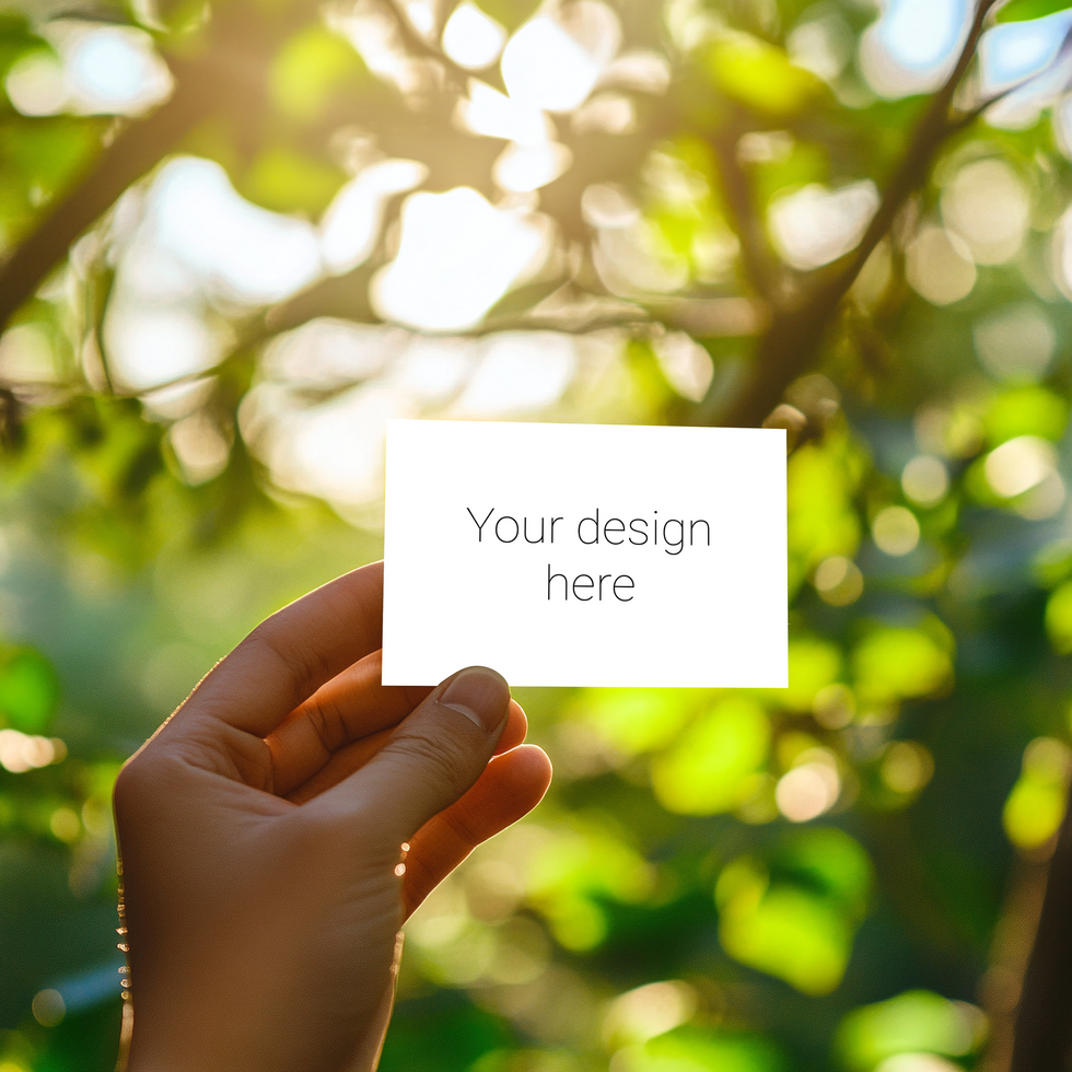 Woman's hand holding a blank business card mockup psd
