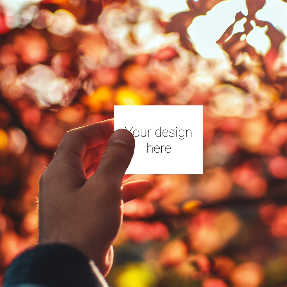Man holding a blank card mockup psd