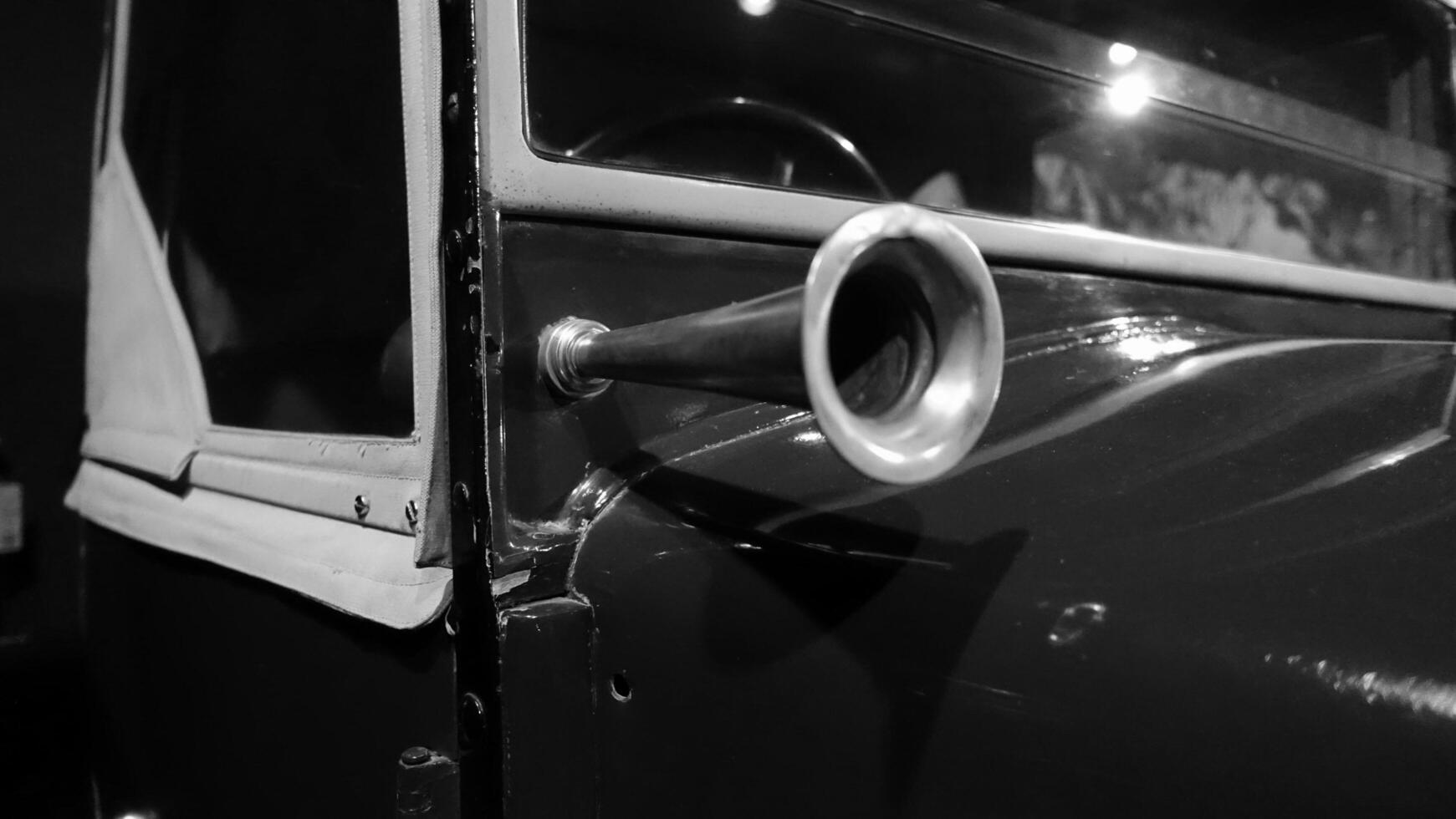 Turin, Italy - June 20, 2021. a detail of an antique automobile at Automobile Museum. photo